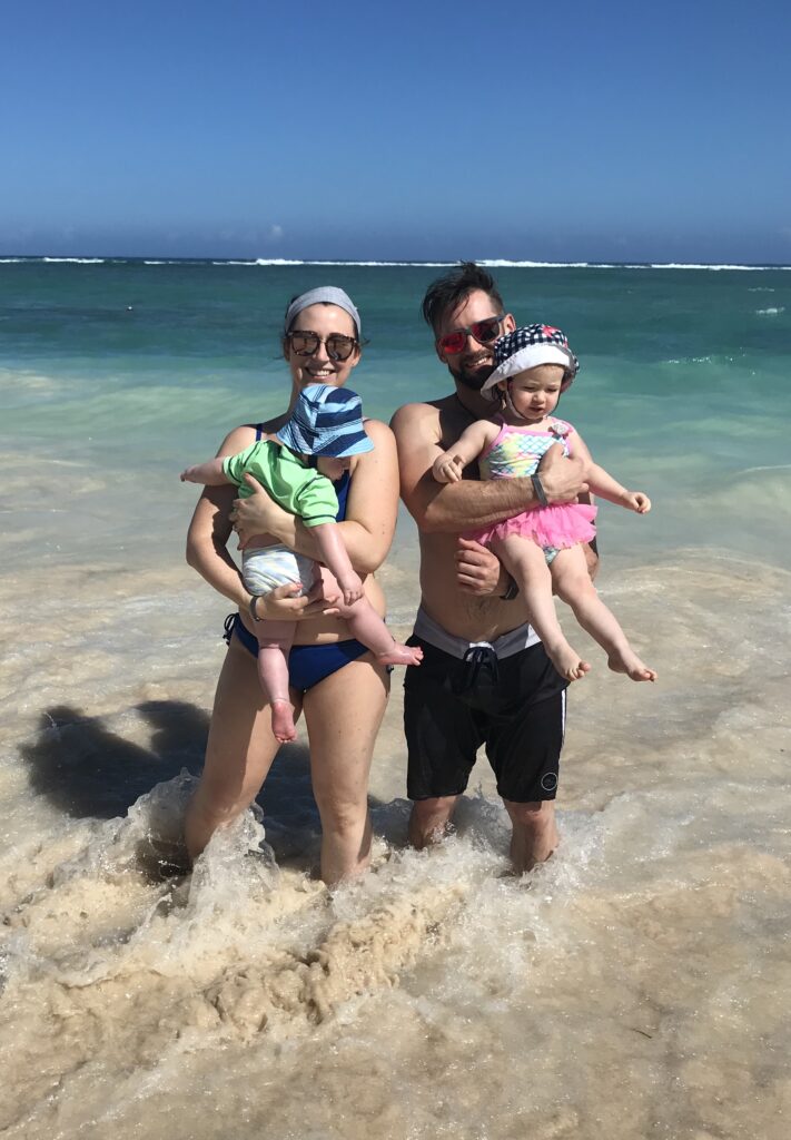 My family - mommy daddy and two babies on the beach in Punta Cana